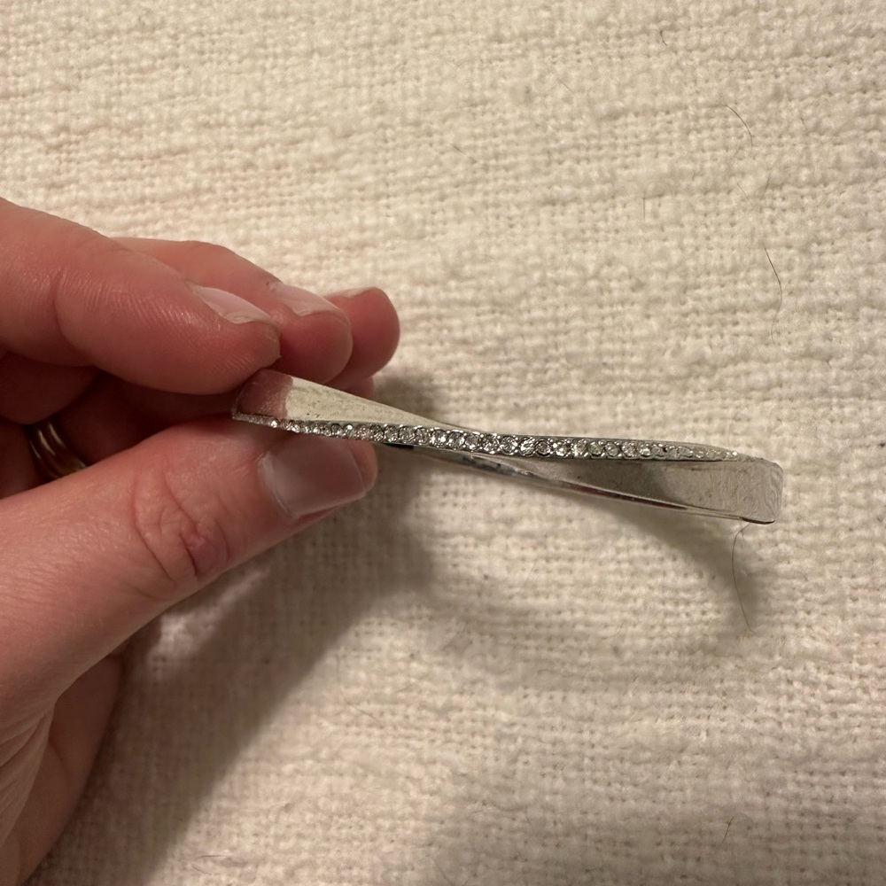Silver and rhinestone twisted Kate Spade bracelet